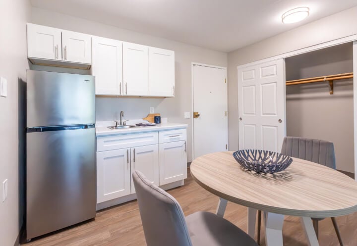 Full Kitchen and Dining Area at Independent Living Apartment Full Kitchen and Dining Area at Independent Living Apartment