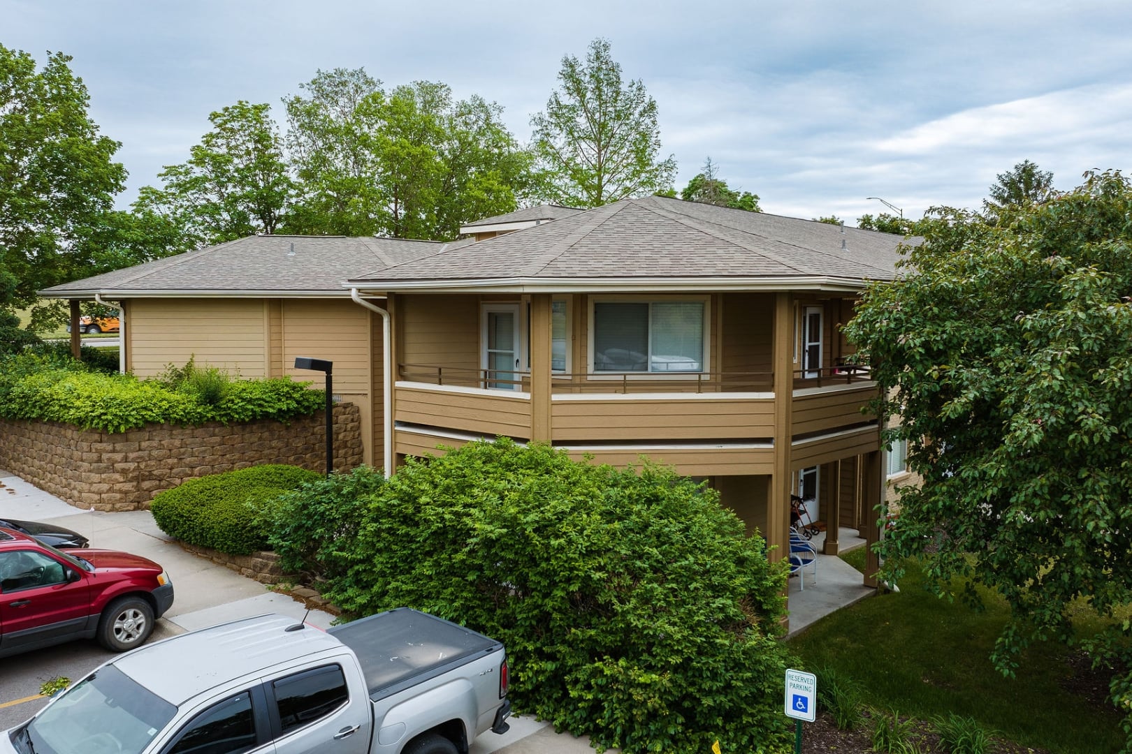 Exterior View of Residential Building With Green Landscaping at Independent Living Community