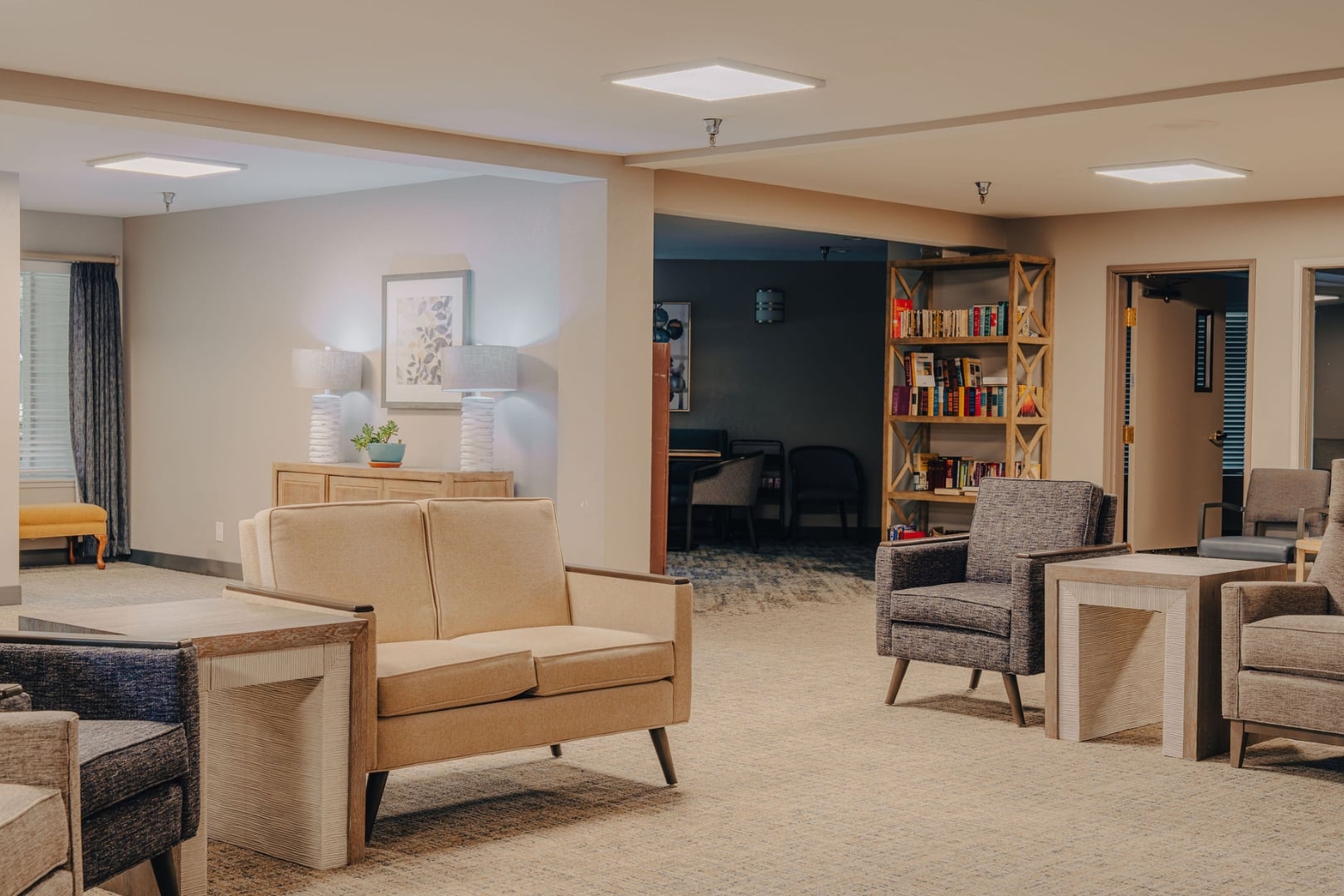 Common Lounge Area With Comfortable Seating at Independent Living Facility