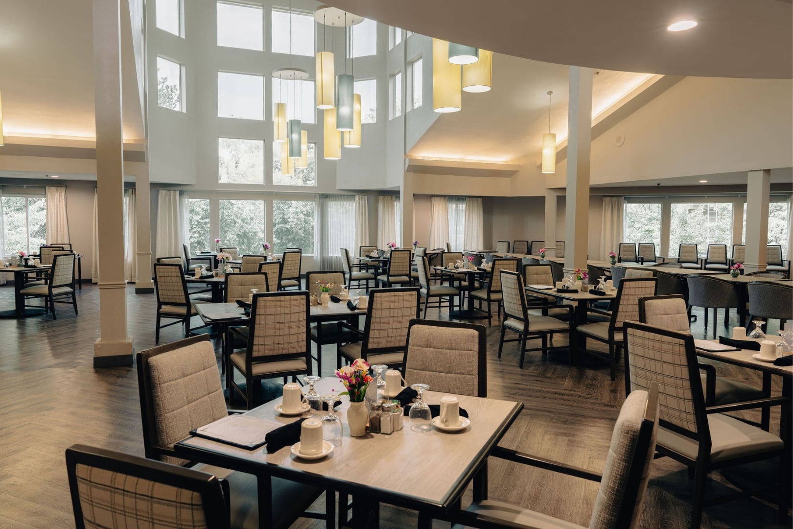 Elegant Dining Hall With Abundant Natural Light at Independent Living Facility