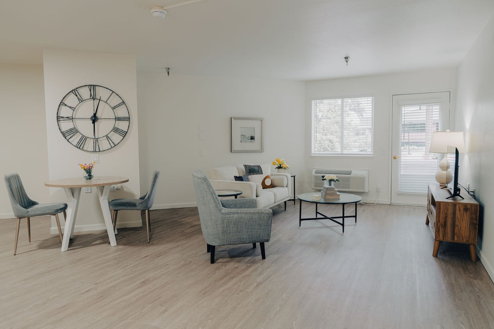 Bright Open-Concept Apartment Living Room at Independent Living Community